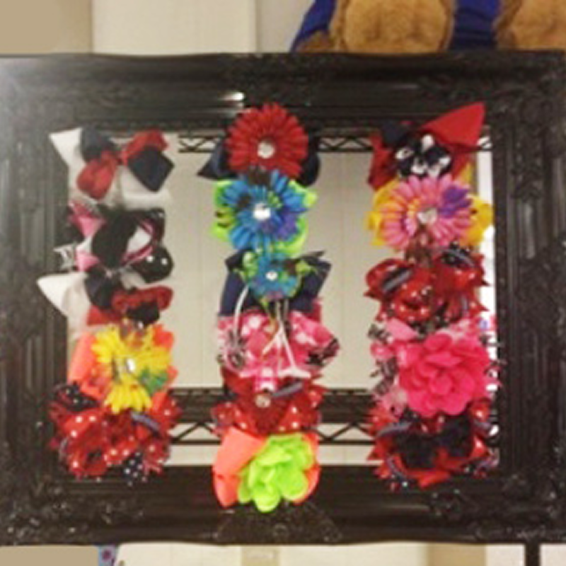 Vibrant bows arranged on decorative frame