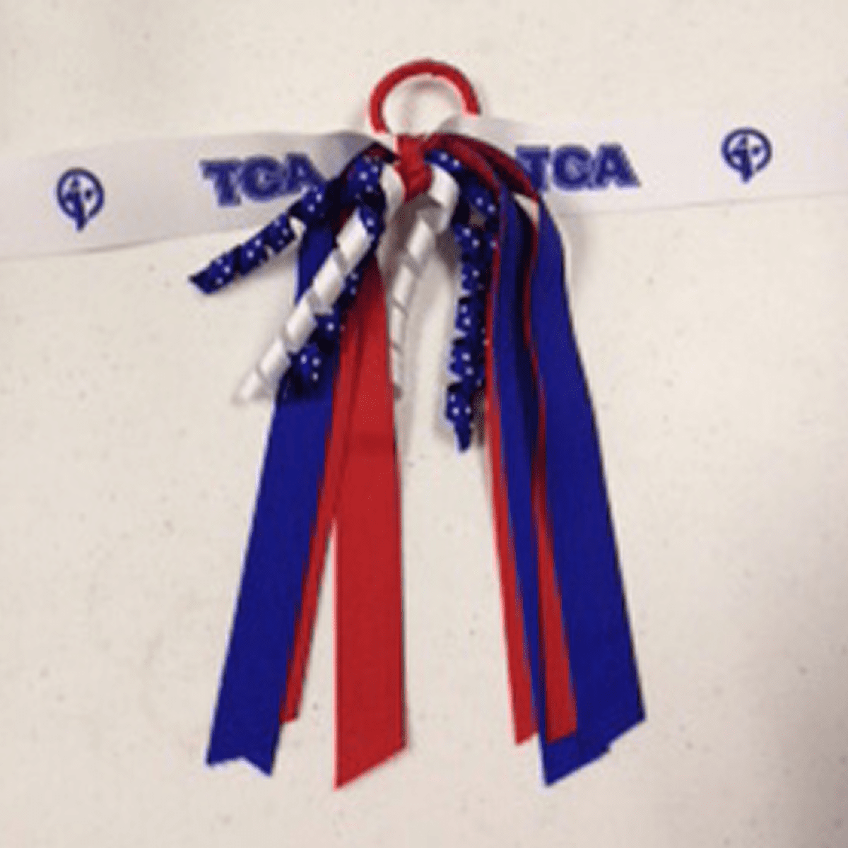 TCA ribbon with colorful streamers
